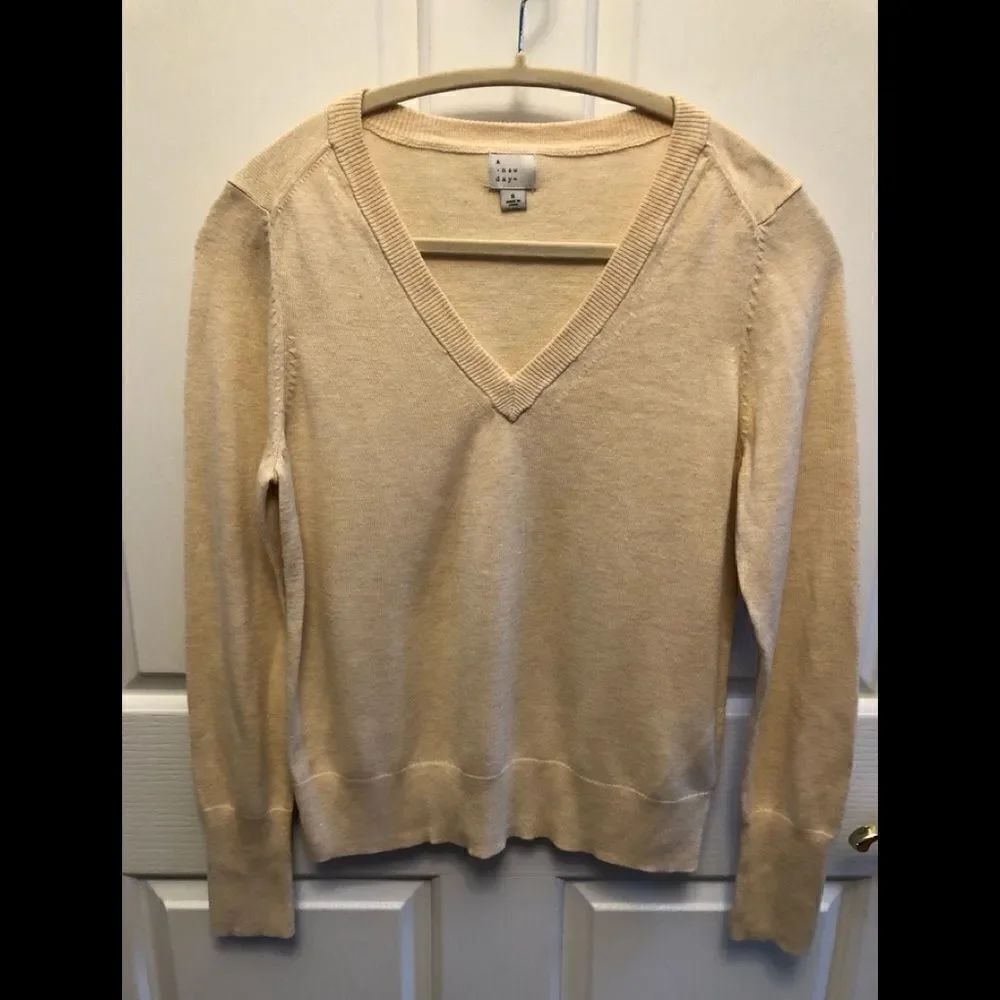 A New Day sweater